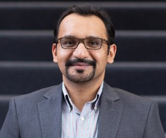 Headshot of Dr. Alaptagin Khan
