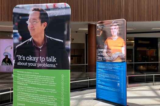 Display of images of people and text about their mental health journeys