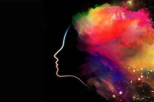 Graphic of head with colorful cloud or cosmos