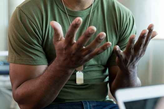 Military veteran talks with care provider