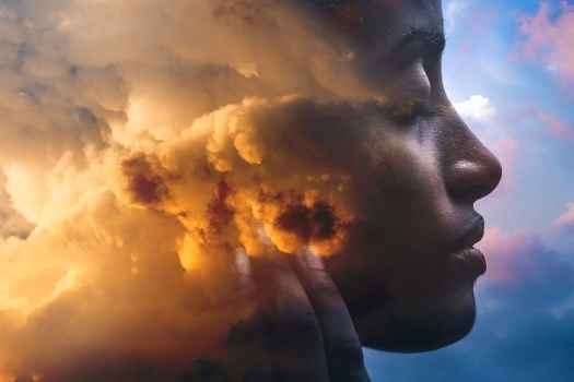 Graphic of clouds in a person’s head