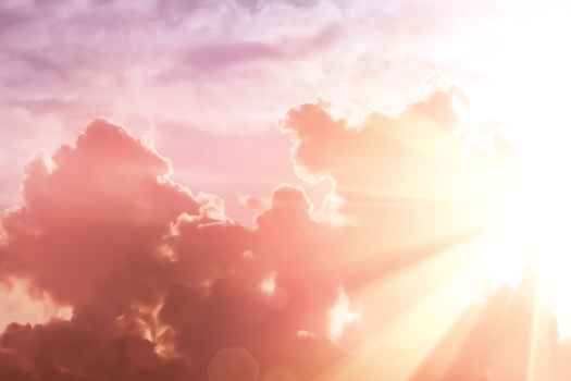 Purple cloudy sky and bold sun