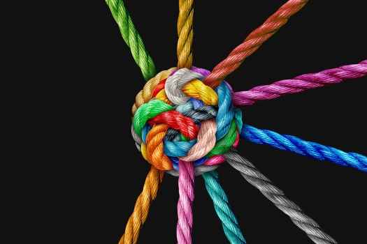 Bright colored rope knotted into a ball
