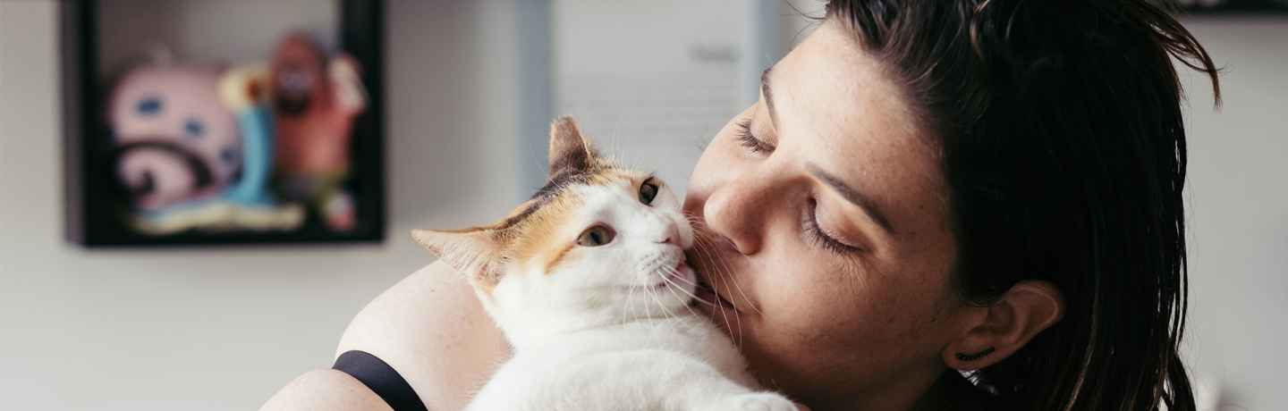 Deconstructing Stigma participant Noam - Person kisses cat