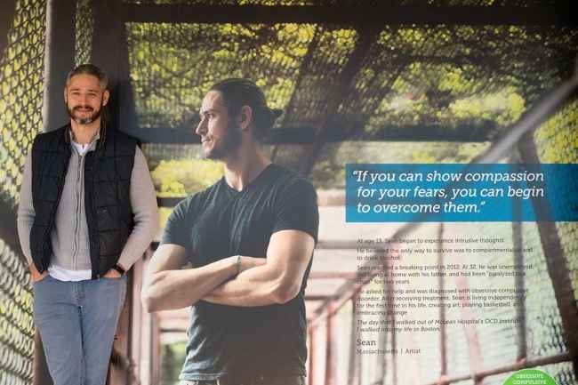 Deconstructing Stigma participant standing in front of a display