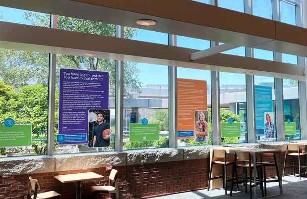 Window panels with Deconstructing Stigma posters