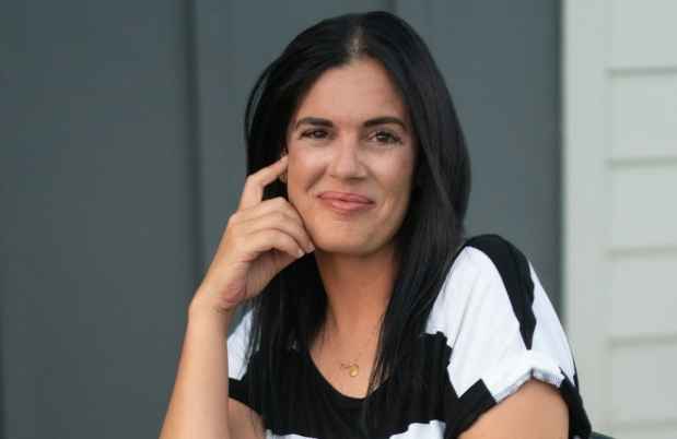 Participant Lisha - person with dark hair wearing a striped shirt