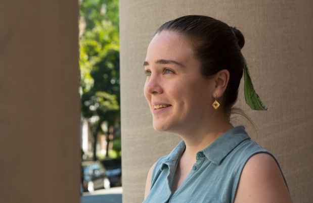 Participant Maria - person with dark hair tied back and wearing a blue tank top