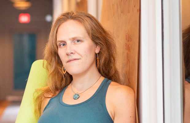 Participant Sandy - person with long wavy hair wearing a tank top