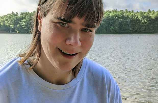 Participant Beth by a lake