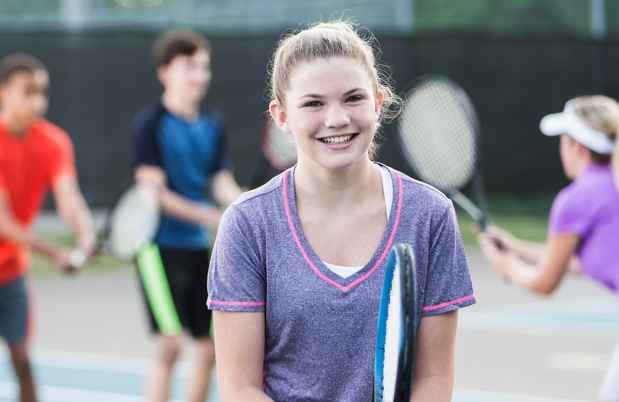 Girl holding a tennis racquet