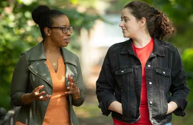 Clinician and patient walk and talk outside
