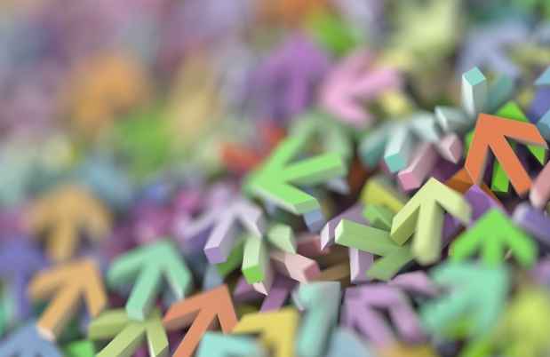 Colorful three-dimensional arrows in a pile