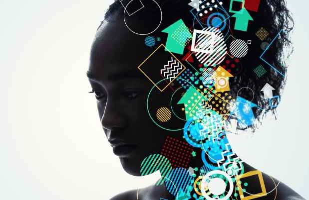 Young woman’s head with graphics of shapes swirling