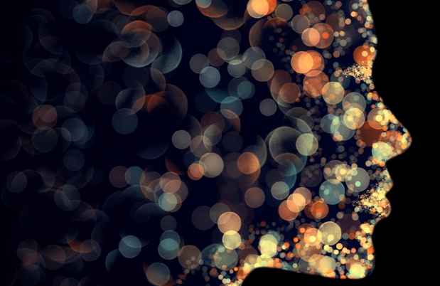 Illustration of a profile composed of glowing dots