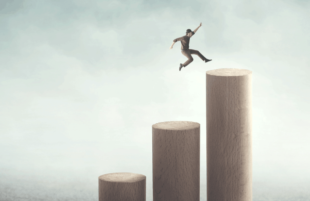 Illustration of a small figure jumping on large, tall cylinders