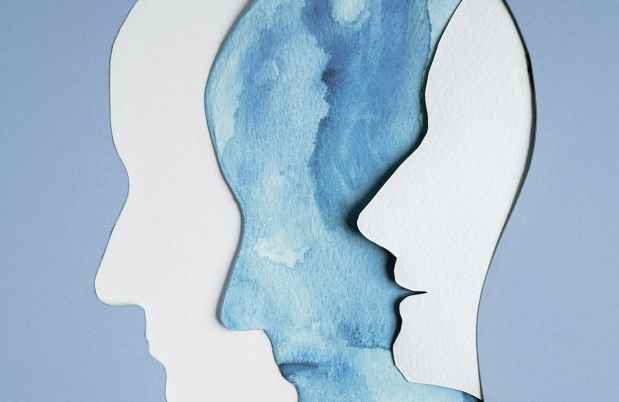 Paper cut outs of heads