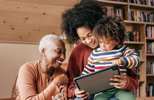 3 generations of look at a tablet