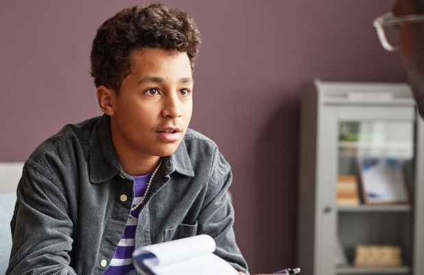 Teen talks to therapist