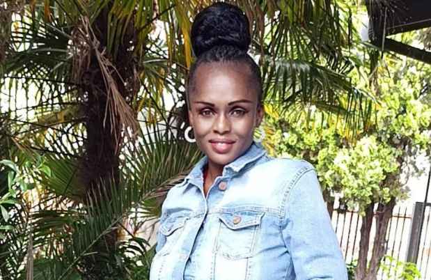 Deconstructing Stigma participant Fancy - person in jeans outfit stands outside