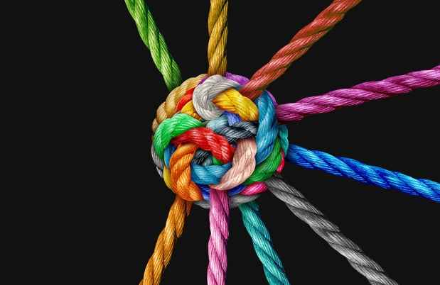 Bright colored rope knotted into a ball