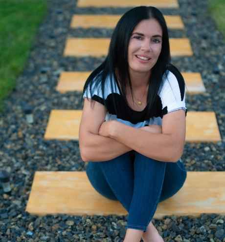 Participant Lisha - person with dark hair wearing a striped shirt