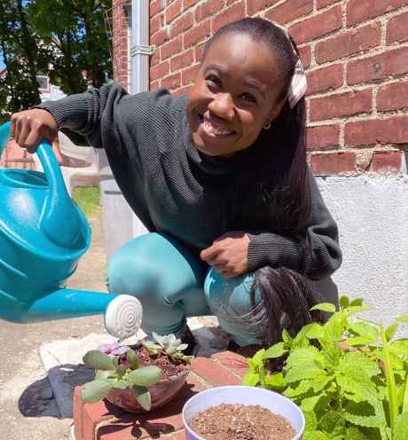 Participant Adati watering plants