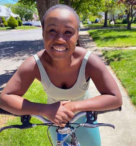 Participant Adati on her bicycle