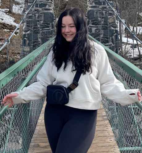 Participant Daria standing on a bridge