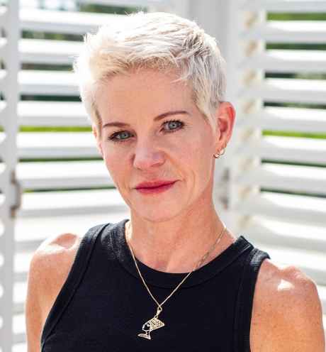Participant Molly - person with short blond hair wearing a black tank top