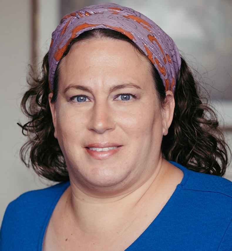 Deconstructing Stigma participant Judith - portrait of person with kerchief in hair, blue shirt