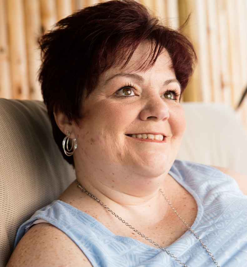 Participant Lisa - person with short hair smiling