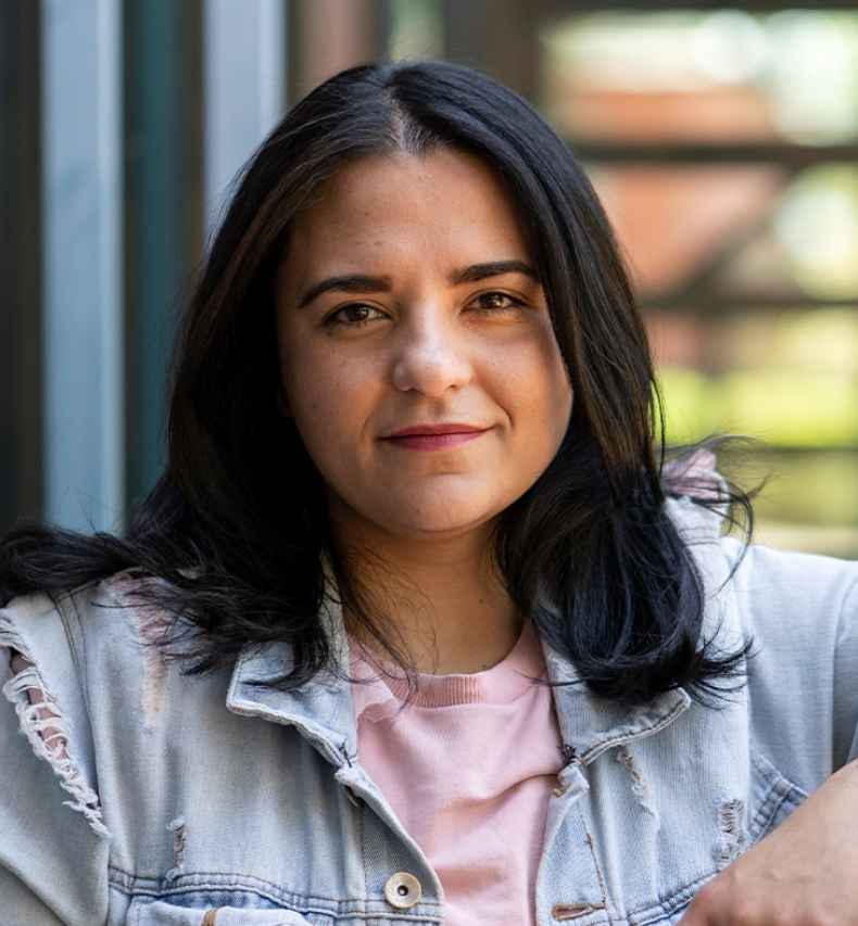 Participant Natasha - person with short dark hair wearing a jean jacket