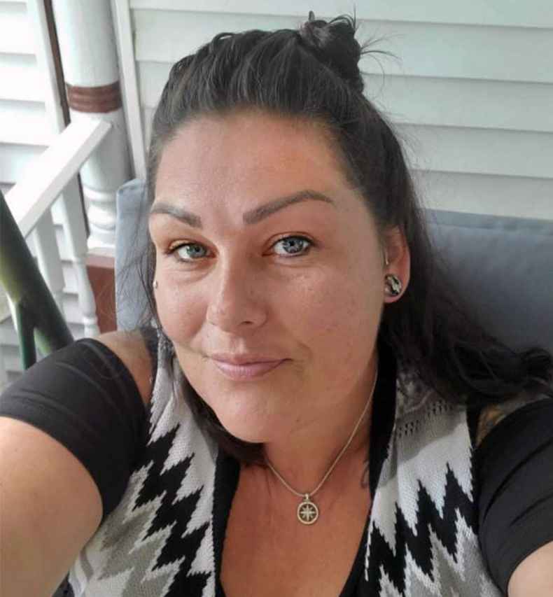 Participant Kasie - person wearing black and white vest in an outdoor photo