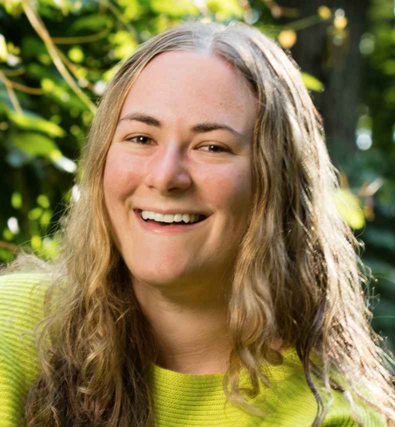 Participant Shellye - person with long wavy blond hair smiling outside