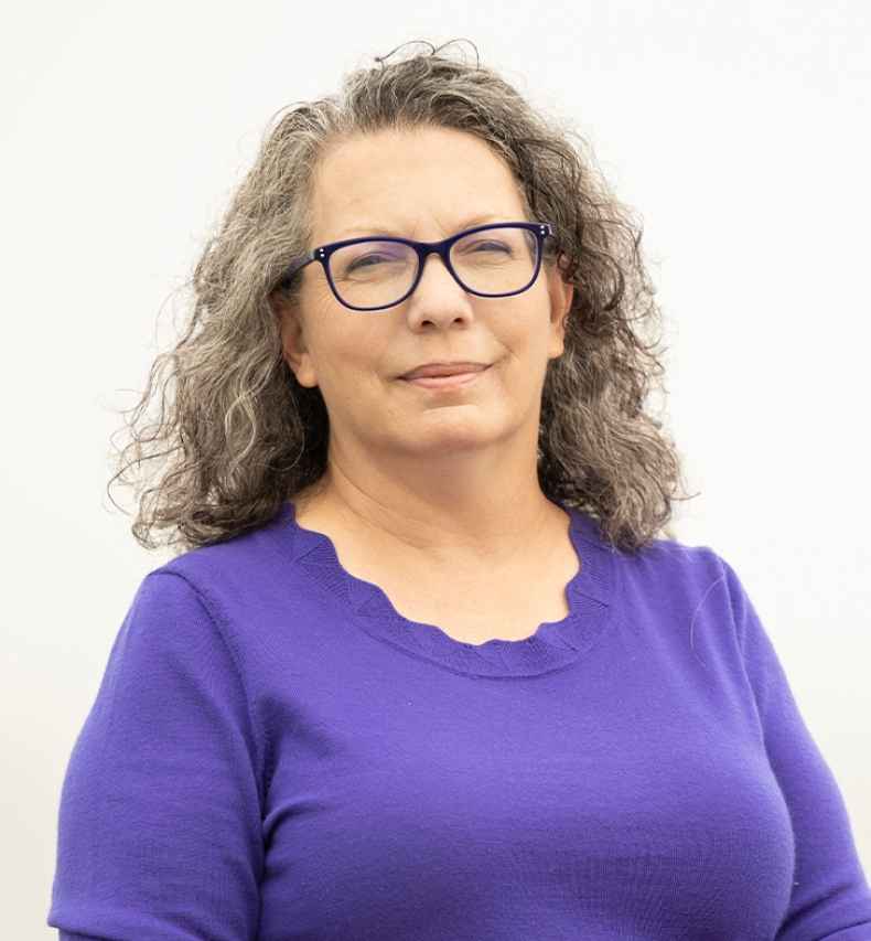 Participant April - woman with purple shirt, glasses