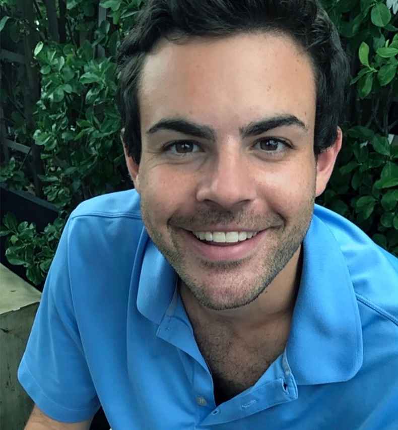 Participant Jon is wearing a blue polo and smiling