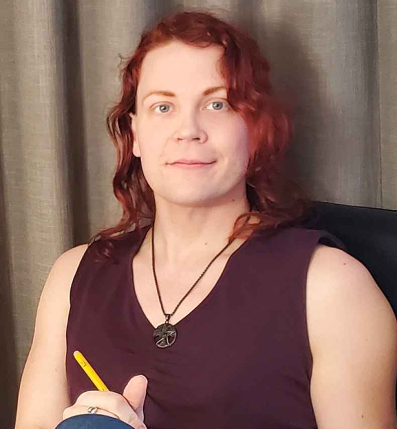 Participant Madison - person with red hair in a burgundy tank top