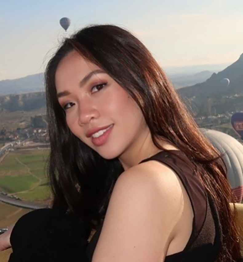 Deconstructing Stigma participant Josette - person in hot air balloon with vista of other flying balloons