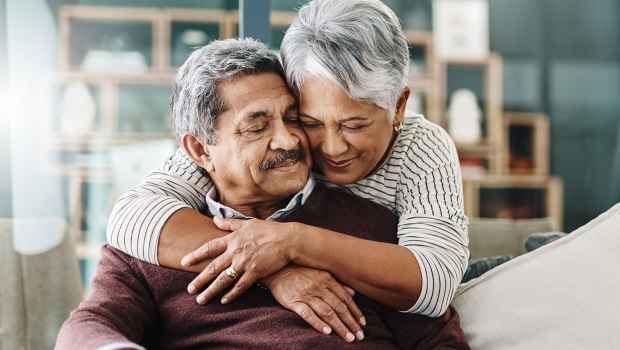 Older couple hugs