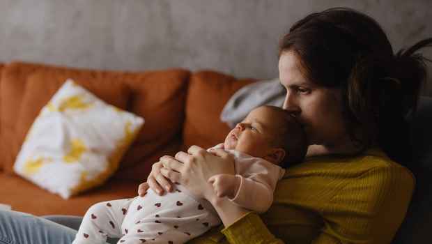 Mom holds baby