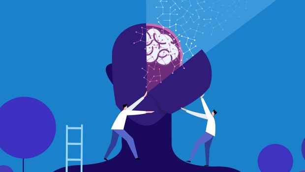 illustration of doctors opening up head to see a brain