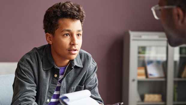 Teen talks to therapist