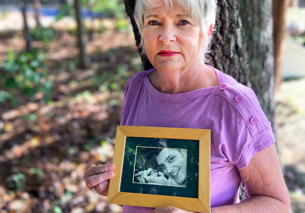 Woman holding a picture