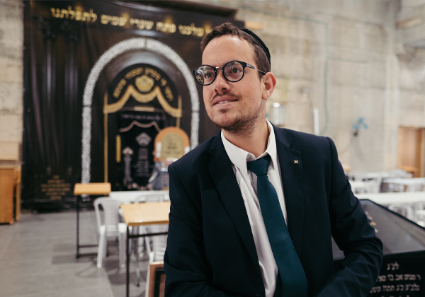 man with glasses in synagogue