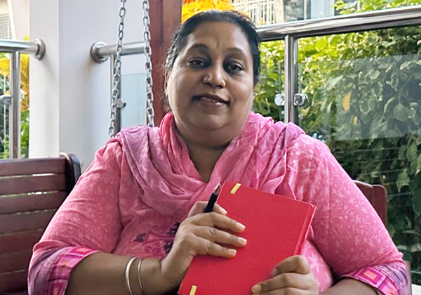 Woman holding a red book